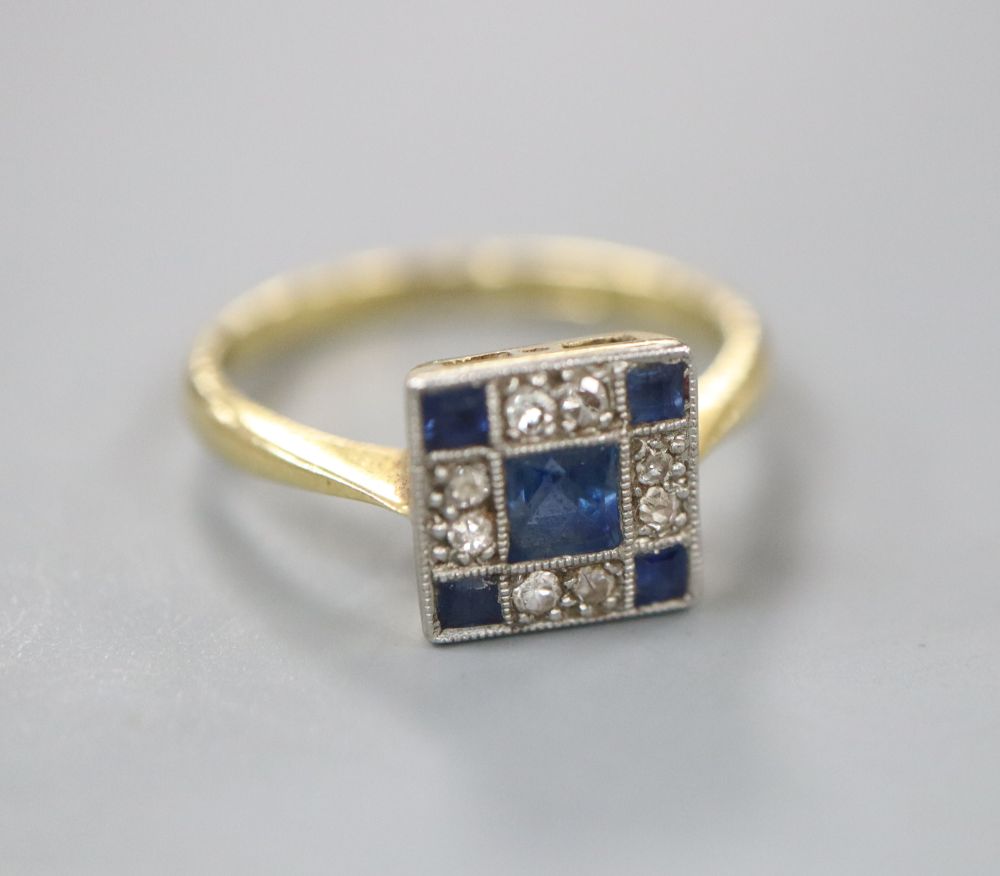 A 1920s 18ct and Pt, sapphire and diamond set tablet ring, size H, gross 2.3 grams.